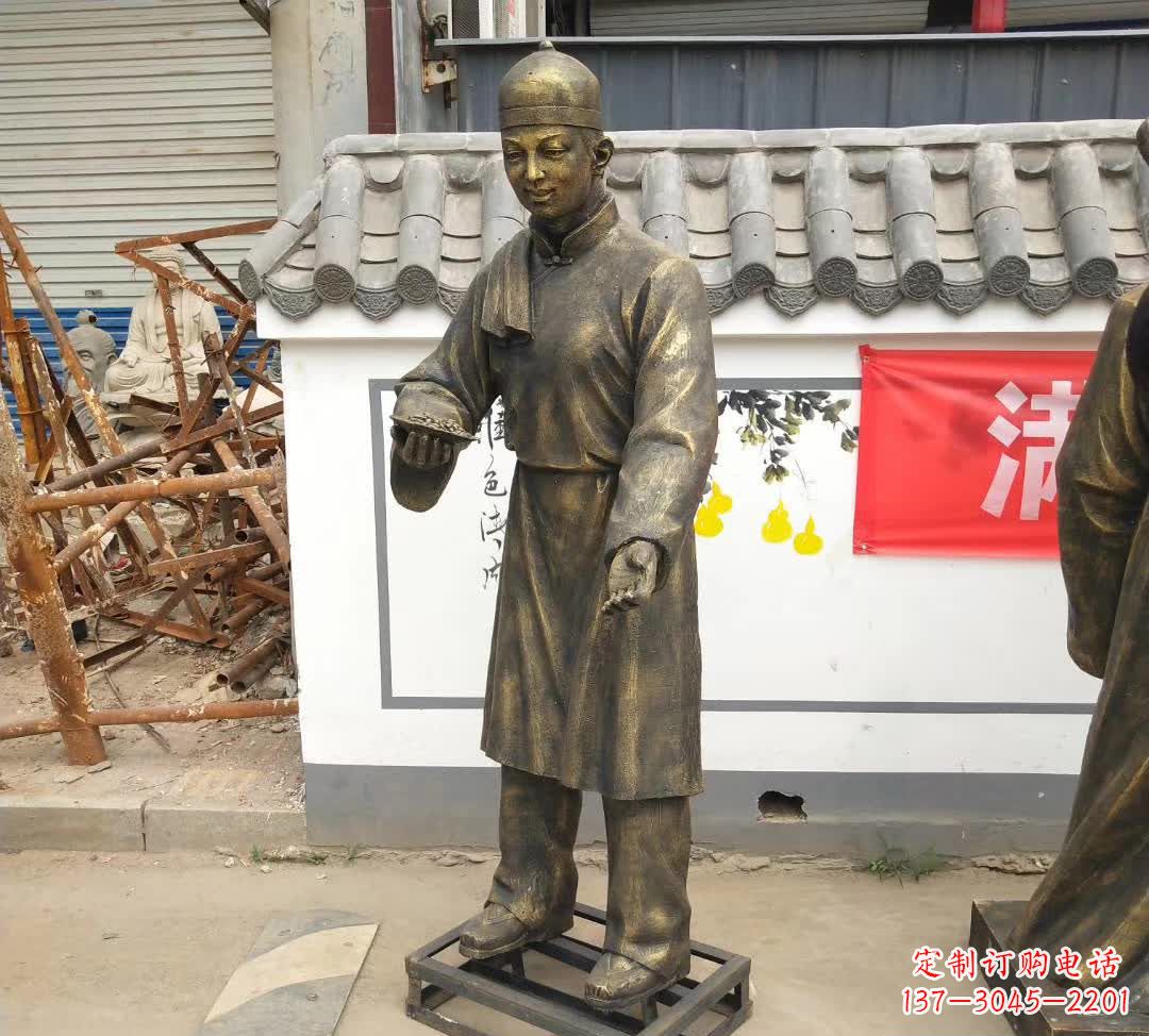 运城步行街店小二人物铜雕