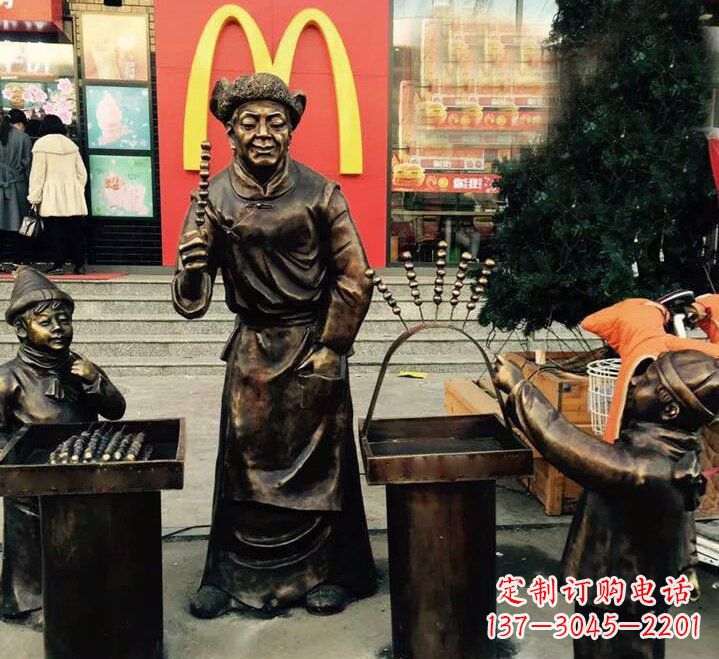 运城步行街卖糖葫芦的人物铜雕