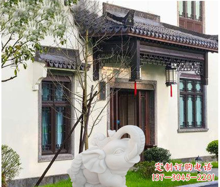运城踩元宝铜钱的小象门口招财石雕
