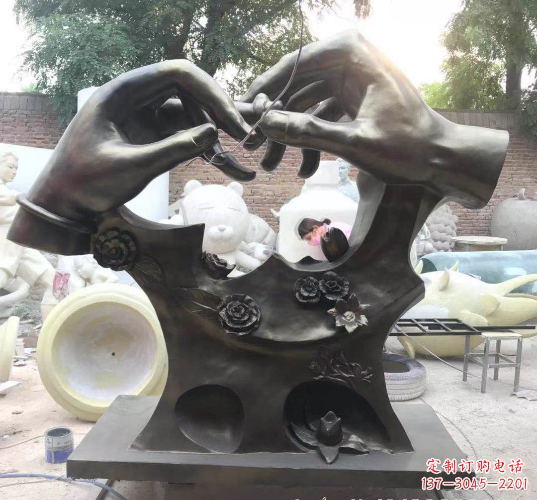 运城戴戒指景观铜雕