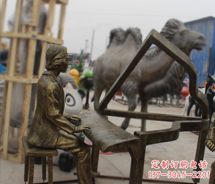 运城弹抽象钢琴的人物铜雕