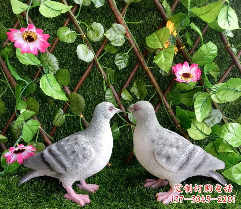 运城雕塑小女孩一只手拿书一手和平鸽