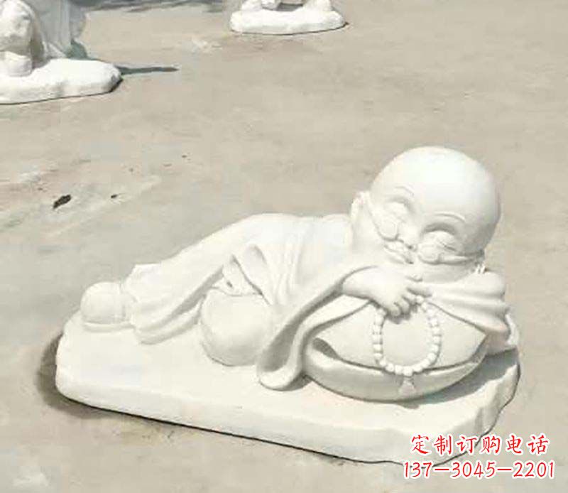 运城汉白玉摆姿势的小和尚雕塑