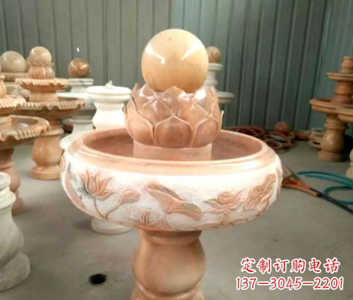 运城石来运转晚霞红风水球喷泉石雕