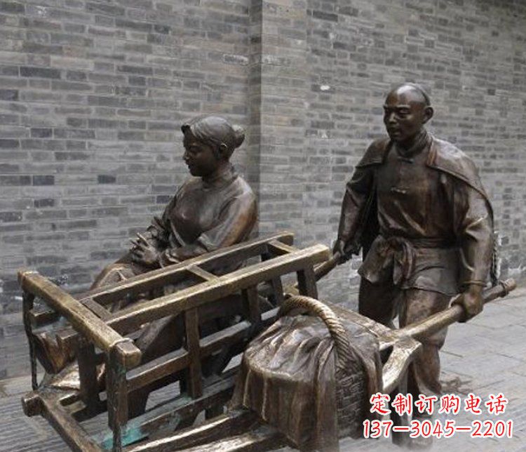 运城推独轮车的人物铜雕
