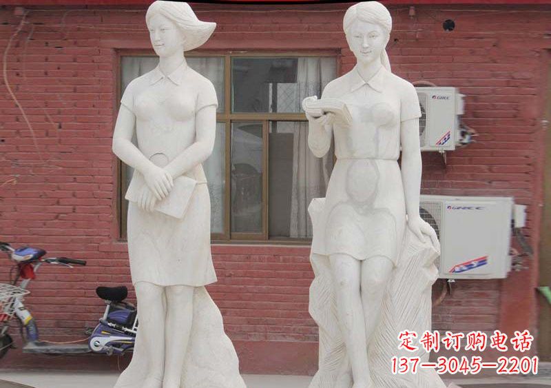运城校园拿书本的学生石雕