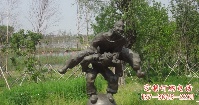 运城园林站在球上面跳山羊的人物景观铜雕