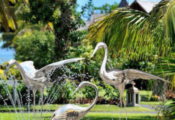 运城鹤雕塑-公园池塘不锈钢镜面抽象喷泉中的鹤雕塑